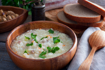 Kulesh, traditional Ukrainian soup of millet and bacon soup, horizontal