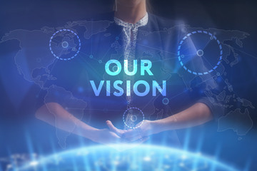 The concept of business, technology, the Internet and the network. A young entrepreneur working on a virtual screen of the future and sees the inscription: Our vision