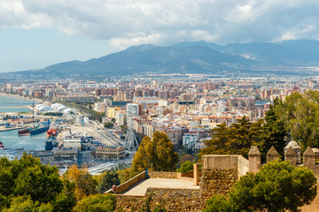Fototapeta premium Panoramic and aerial view of Malaga in a beautiful spring day, Spain