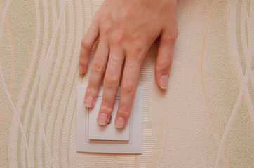 light switch, the female hand