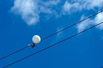 balloons caught on power line wires