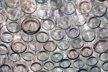 Many colored wine bottles, bottom view. Concept designer ceiling in restaurant, bar, creative interior
