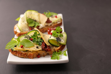 sandwich with zucchini, cheese and basil