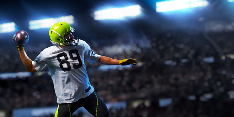 American football sportsman player on stadium in action. Sport advertising © Anna Stakhiv