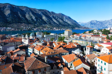 Naklejka na ściany i meble Top view of the old town and big ship in Kotor, Montenegro
