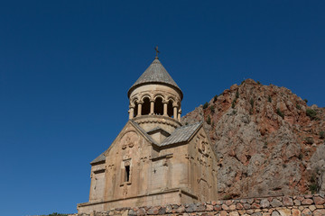 Fototapeta na wymiar Noravank monastery complex built on ledge of narrow gorge. Armenia