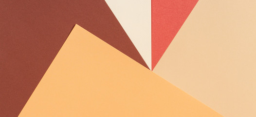Abstract geometric paper texture cardboard background. Beige, brown yellow pastel trendy colors