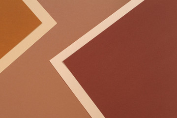 Color papers geometry composition background with beige and brown tones