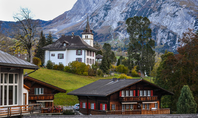 Landscape with mountain village in autumn