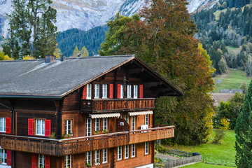 Landscape with mountain village in autumn
