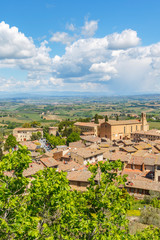 Fototapeta premium View of San Gimignano and a rural landscape view in Tuscany, Italy