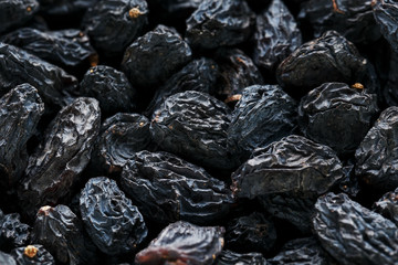 Black Raisin texture, popular dried fruit. Dried grapes.