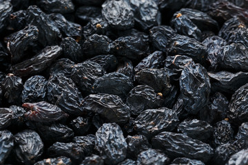 Black Raisin texture, popular dried fruit. Dried grapes.