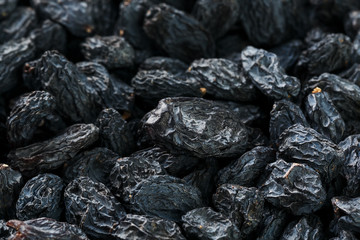 Black Raisin texture, popular dried fruit. Dried grapes.