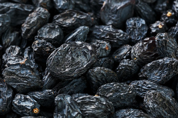 Black Raisin texture, popular dried fruit. Dried grapes.