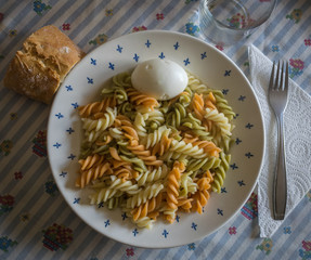 dish of macaroni with an egg
