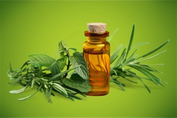 Essential Oil with Rosemary Sprig Isolated