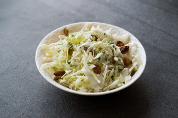 White Cabbage Salad Sauerkraut with Dry Raisins and Dill