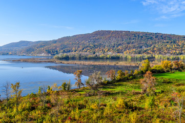 Fototapeta na wymiar Lake George Reflecting the Autumn Colors of Ticonderoga in Upstate New York