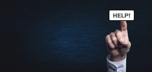 Man hand touching Help word. Business concept