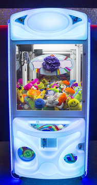 Crane claw machine with stuffed toys