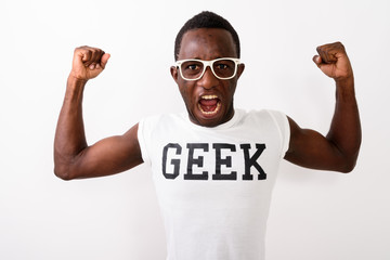 Studio shot of young black African nerd man wearing Geek shirt w - obrazy, fototapety, plakaty