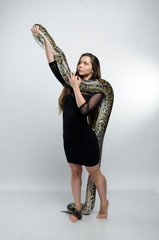 beautiful sensual woman and python.