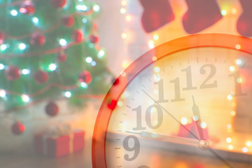 Fototapeta na wymiar Christmas tree and clock in double exposure