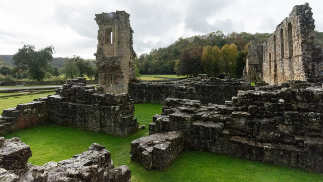 The ruins of the church Abbey. A shell of a building, stone walls and window arches largely intact but no roof