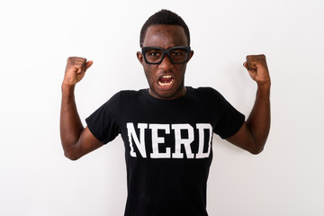 Studio shot of young black African geek man wearing Nerd shirt w - obrazy, fototapety, plakaty