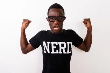 Fotobehang Studio shot of young black African geek man wearing Nerd shirt w © Ranta Images