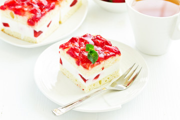 strawberry cake. dark background.