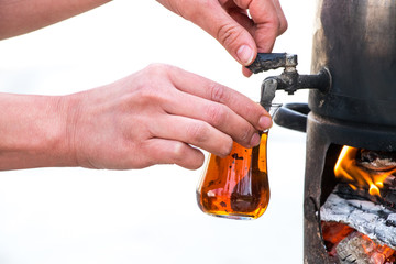 Dirty samovar with hot tea