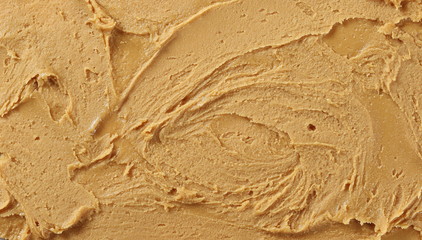 Naklejka na ściany i meble Peanut butter background and texture