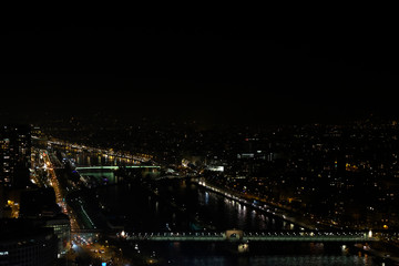 Fototapeta na wymiar View over Paris by Night from Eiffel Tower