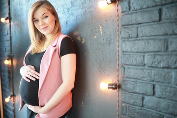 Pregnant young beautiful girl on the ninth month