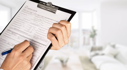 Close-up view of female doctor hands filling