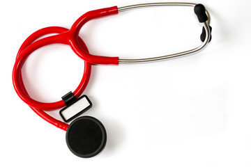 Red stethoscope with black membrane and white sticker isolated on white background. Medicine concept - instrument for auscultation.  Cardiology practice.