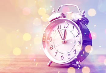 Retro alarm clock on   background