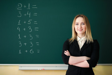 Young teacher in school class