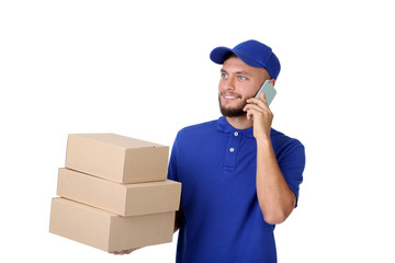Delivery man with cardboard boxes and smartphone isolated on white background