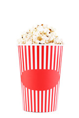 Popcorn in striped bucket isolated on white background