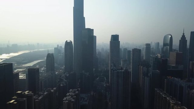Aerial shot of asian megapolis Guangzhou downtown central buildings district on a sunny day in the afternoon