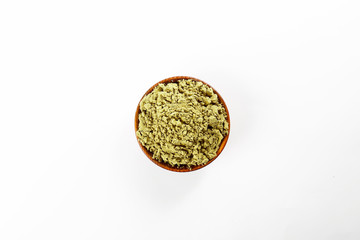 Post workout plant based muscle recovery hemp protein for vegans, bodybuilders and athletes. Healthy dry powder supplement, fitness food, omega 3 & 6 rich. Background, copy space, close up.