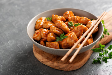 Spicy sweet and sour general tso chicken .