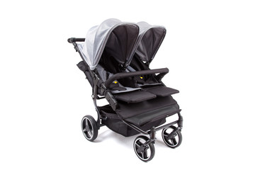 baby carriage, stroller for twins isolated on white background © dechevm