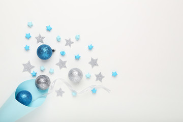 Christmas baubles with stars on white background