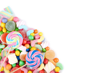 Sweet candies and lollipops on white background