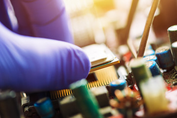 Computer forensics investigator installing old cpu