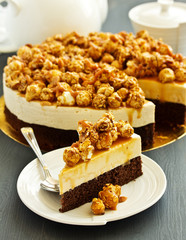 Chocolate-caramel cheesecake with popcorn.